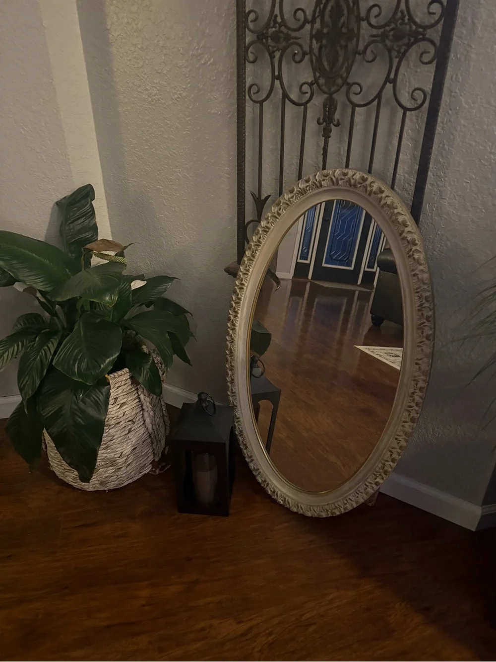 Vintage Oval Wall Mirror Featuring An Ornate, Off-White And Gold-Accented Frame